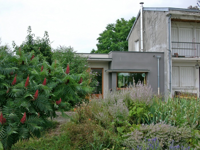 R�novation et extension �cologique tr�s haute performance �nerg�tique.